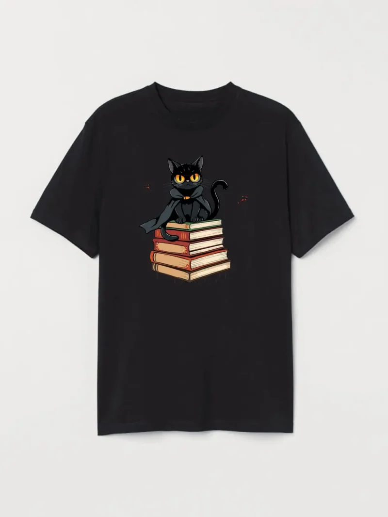 A Mysterious Black Cat Guards Its Literary Secrets Perched Atop A Stack Of Enchanting Stories T-Shirt - Image 2